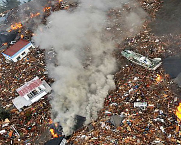 Large quantity of waste meterial spread all over in the city in Japan, earthquake knock the door in 11 march 2011
